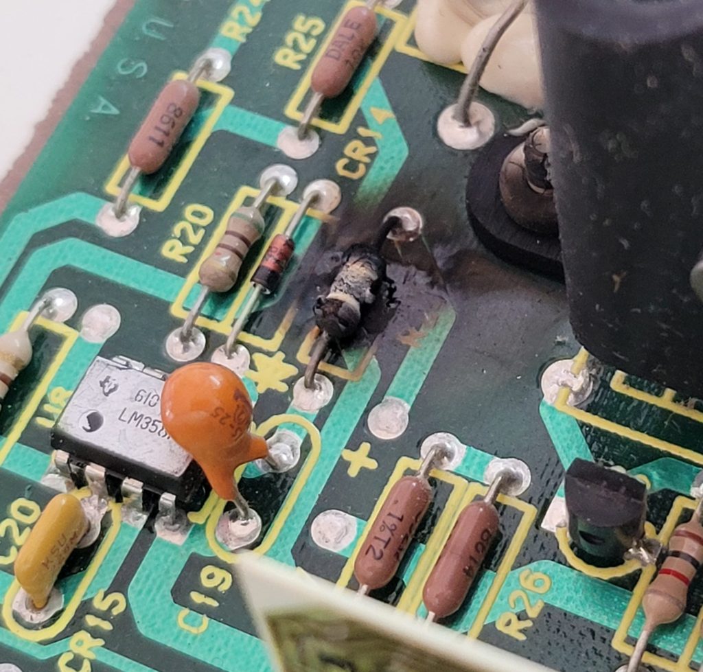 Open capacitor on circuit board shorting out power supply